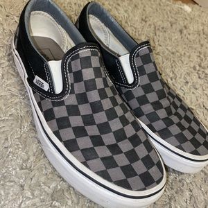 Black and grey checkered vans
